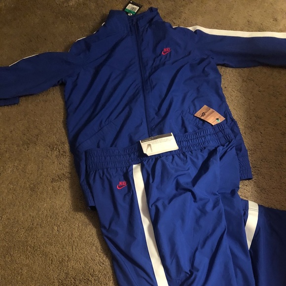 blue and white nike jogging suit